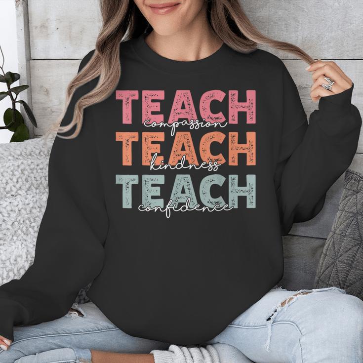 Teach Compassion Kindness Confidence For Teacher Unisex Sweatshirt, funny design Teach Compassion Kindness Confidence For Teacher Unisex Sweatshirt, funny design