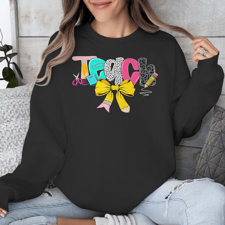 Teach Coquette Bow Teacher Back To School Happy First Day Unisex Sweatshirt, funny design Teach Coquette Bow Teacher Back To School Happy First Day Unisex Sweatshirt, funny design