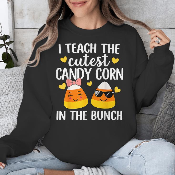 I Teach The Cutest Candy Corn In The Bunch Teacher Halloween Unisex Sweatshirt, funny design