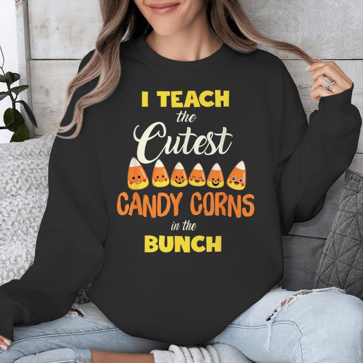 I Teach The Cutest Candy Corn In The Patch Teacher Halloween Unisex Sweatshirt, funny design