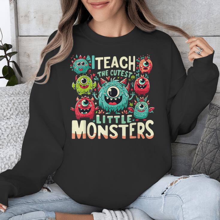 I Teach The Cutest Little Monsters Teacher Halloween Outfit Unisex Sweatshirt, funny design I Teach The Cutest Little Monsters Teacher Halloween Outfit Unisex Sweatshirt, funny design