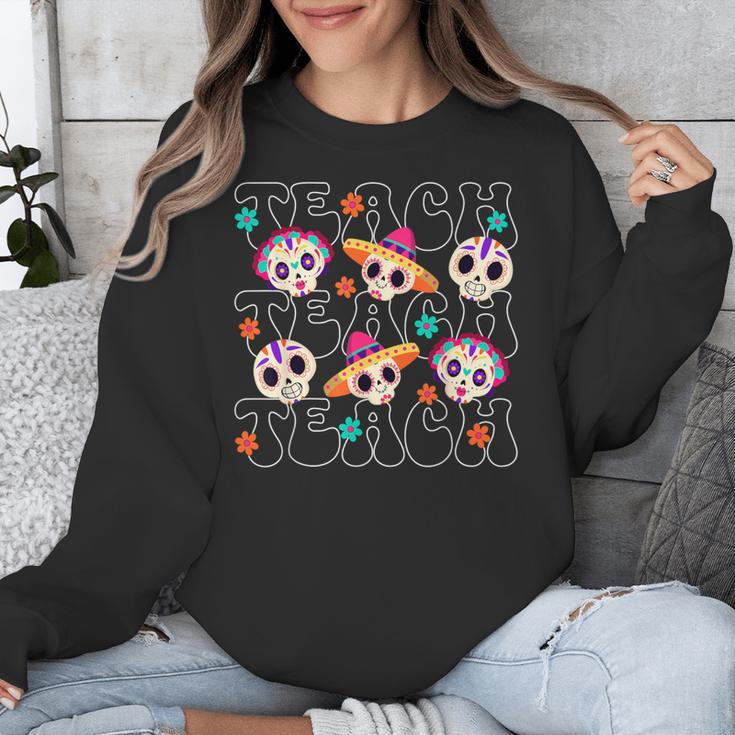 Teach Teacher Dia De Los Muertos Day Of The Dead Sugar Skull Unisex Sweatshirt, funny design Teach Teacher Dia De Los Muertos Day Of The Dead Sugar Skull Unisex Sweatshirt, funny design