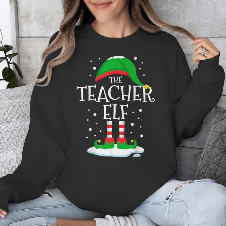 The Teacher Elf Christmas Family Matching Xmas Group For Men Women Unisex Sweatshirt, funny design The Teacher Elf Christmas Family Matching Xmas Group For Men Women Unisex Sweatshirt, funny design