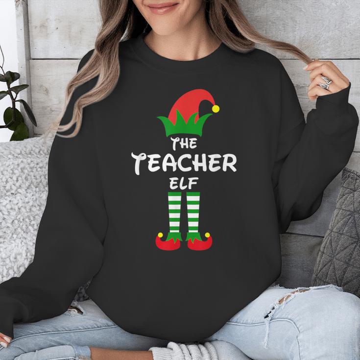 The Teacher Elf Family Matching Group Idea Christmas Unisex Sweatshirt, funny design The Teacher Elf Family Matching Group Idea Christmas Unisex Sweatshirt, funny design