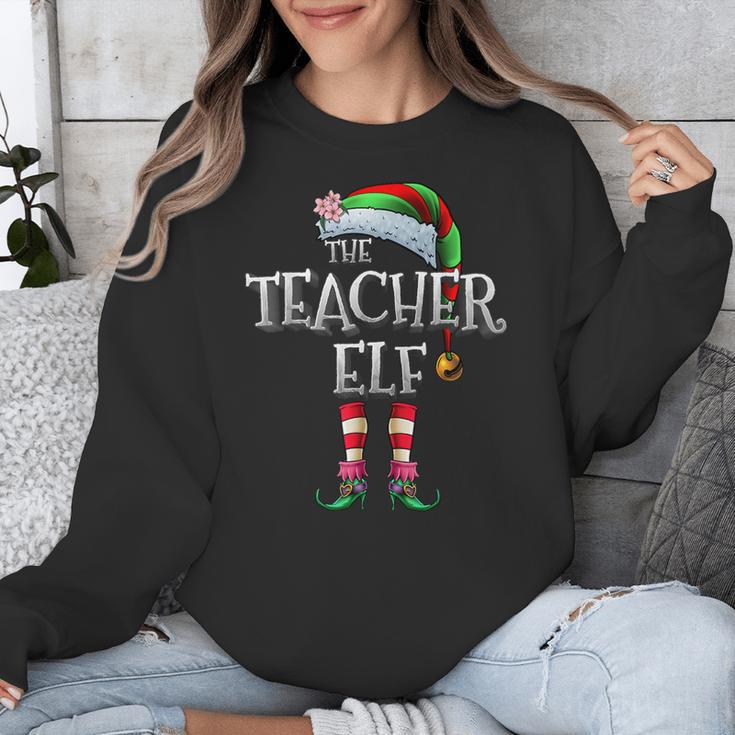 The Teacher Elf Shirt Matching Family Christmas Elf Men Women Kids Unisex Sweatshirt, funny design The Teacher Elf Shirt Matching Family Christmas Elf Men Women Kids Unisex Sweatshirt, funny design