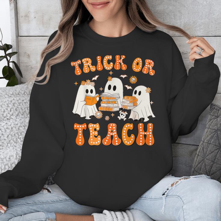 Teacher Halloween Trick Or Teach Retro Groovy Floral Ghost Unisex Sweatshirt, Groovy Teacher Gifts, funny design
