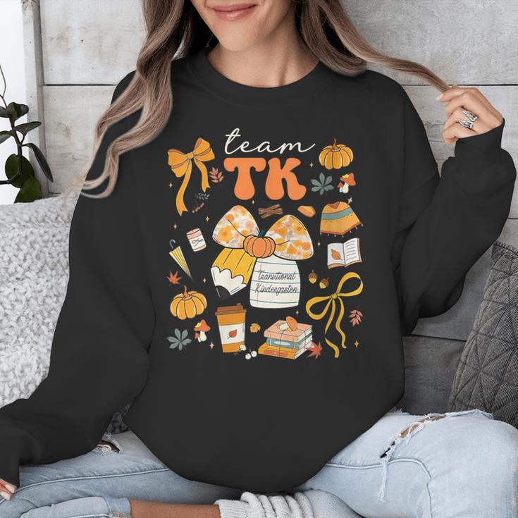 Team TK Crew Preppy Coquette Bow Pumpkin Fall TK Teacher Unisex Sweatshirt, funny design Team TK Crew Preppy Coquette Bow Pumpkin Fall TK Teacher Unisex Sweatshirt, funny design