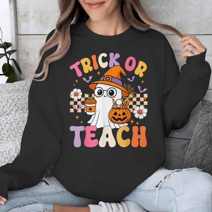 Trick Or Teach Cute Ghost Coffee Pumpkins Halloween Teacher Unisex Sweatshirt, funny design Trick Or Teach Cute Ghost Coffee Pumpkins Halloween Teacher Unisex Sweatshirt, funny design