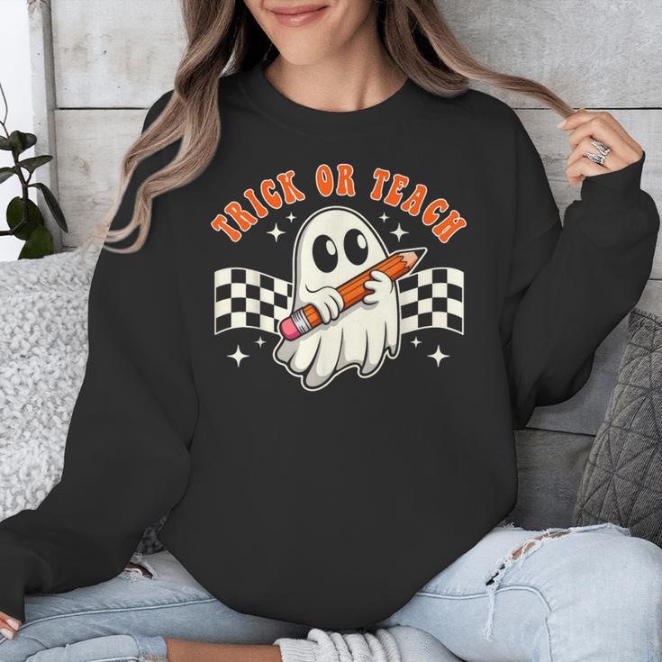 Trick Or Teach Groovy Retro Ghost Halloween Teacher Kids Unisex Sweatshirt, Groovy Teacher Gifts, funny design