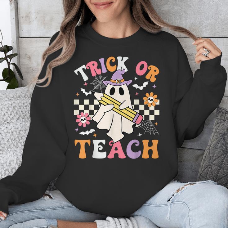 Trick Or Teach Groovy Teacher Halloween Retro Teacher Ghost Unisex Sweatshirt, Groovy Teacher Gifts, funny design