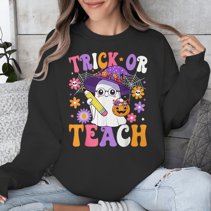Trick Or Teach Teacher Ghost Teaching Fun Halloween Teacher Unisex Sweatshirt, funny design Trick Or Teach Teacher Ghost Teaching Fun Halloween Teacher Unisex Sweatshirt, funny design