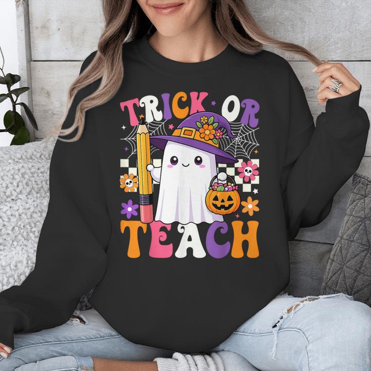 Trick Or Teach Teacher Pencil Ghost Halloween Teacher Unisex Sweatshirt, funny design Trick Or Teach Teacher Pencil Ghost Halloween Teacher Unisex Sweatshirt, funny design