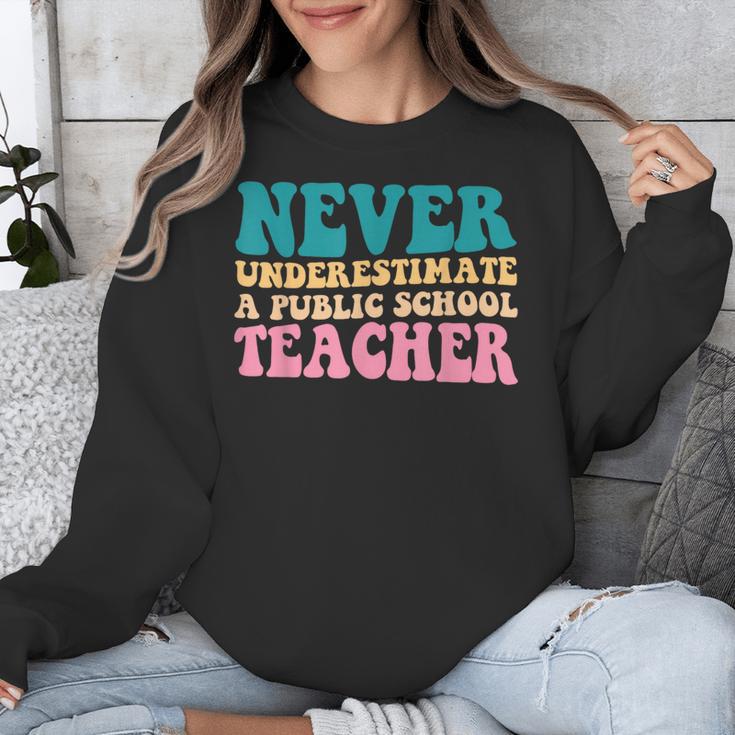 Never Underestimate A Public School Teacher Groovy Women Unisex Sweatshirt, Groovy Teacher Gifts, funny design Never Underestimate A Public School Teacher Groovy Women Unisex Sweatshirt, Groovy Teacher Gifts, funny design