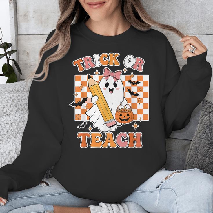 Vintage Teacher Shirt Women Trick Or Teach Halloween Unisex Sweatshirt, funny design Vintage Teacher Shirt Women Trick Or Teach Halloween Unisex Sweatshirt, funny design
