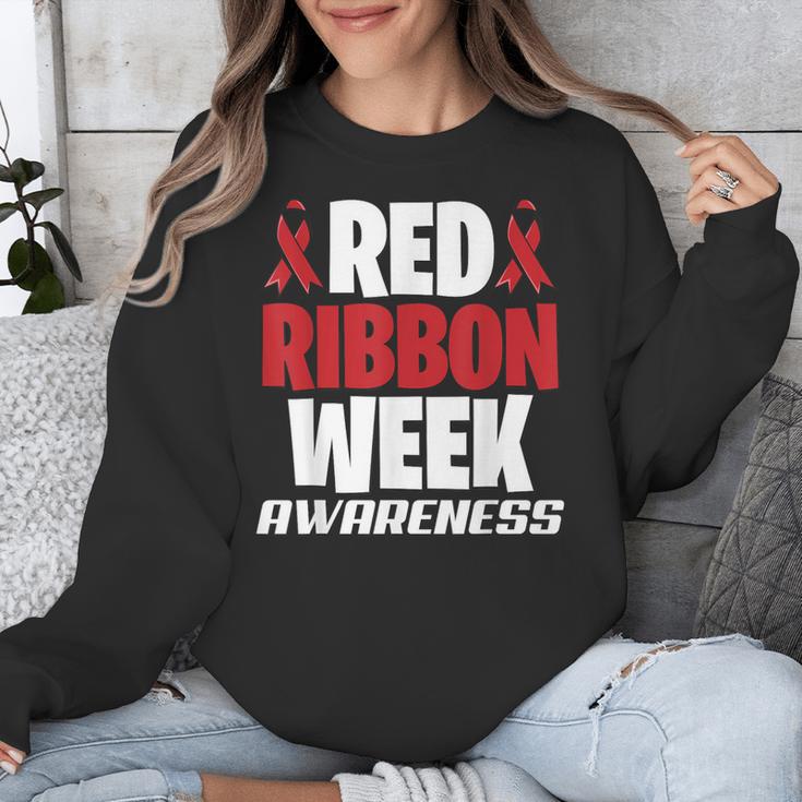 We Wear Red For Red Ribbon Week Awareness Mothers Teachers Unisex Sweatshirt, funny design We Wear Red For Red Ribbon Week Awareness Mothers Teachers Unisex Sweatshirt, funny design