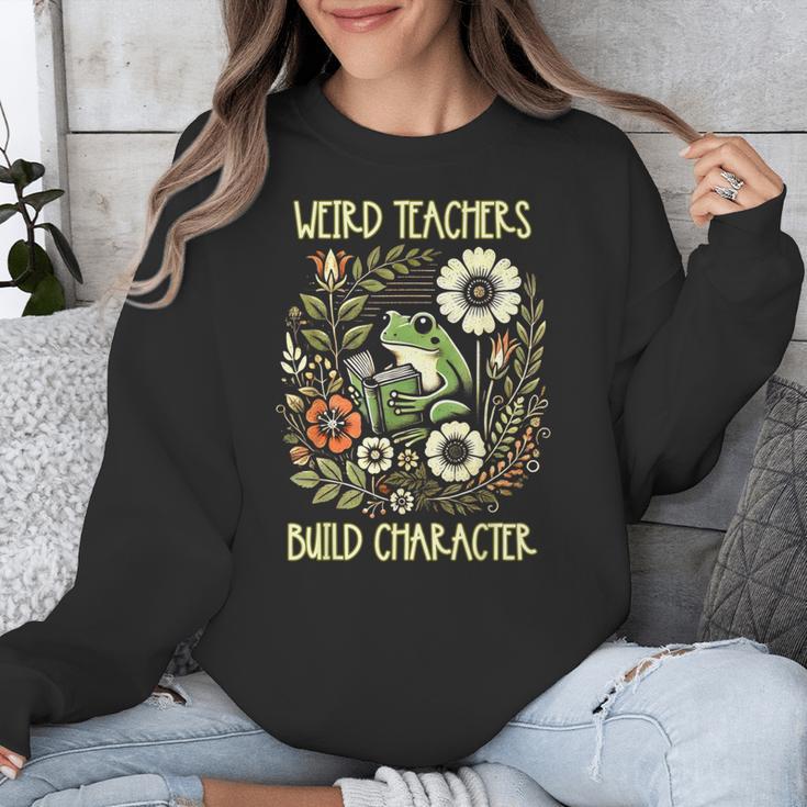 Weird Teachers Build Character Frog Reading Book Librarian Unisex Sweatshirt, funny design Weird Teachers Build Character Frog Reading Book Librarian Unisex Sweatshirt, funny design