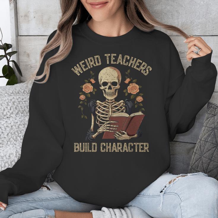 Weird Teachers Build Character Skeleton Book Halloween Women Unisex Sweatshirt, funny design Weird Teachers Build Character Skeleton Book Halloween Women Unisex Sweatshirt, funny design