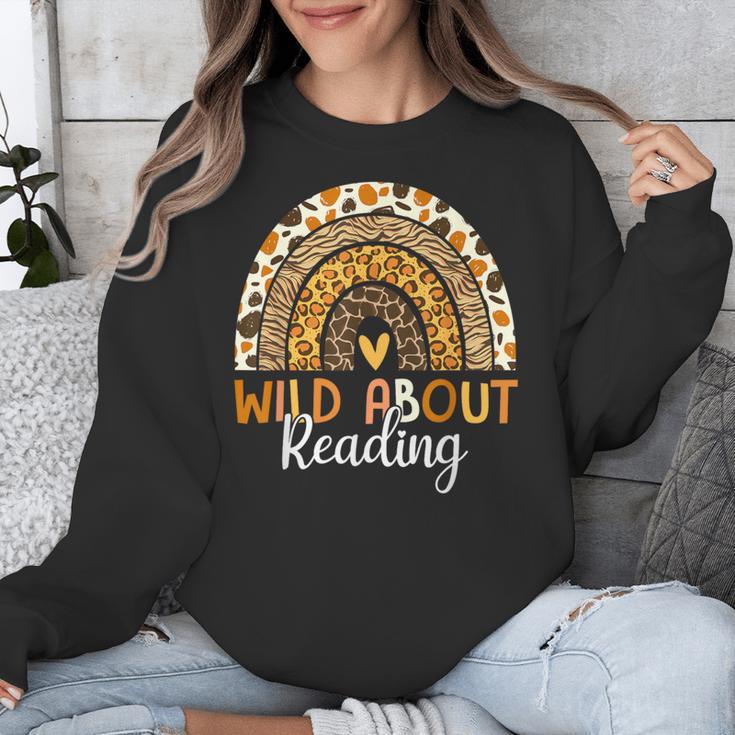 Wild About Reading Teacher Back To School Leopard Rainbow Unisex Sweatshirt, funny design