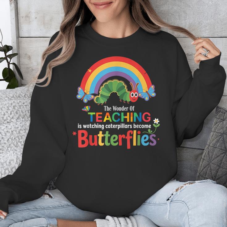 The Wonder Of Teaching Is Watching Caterpillars Teacher Unisex Sweatshirt, funny design The Wonder Of Teaching Is Watching Caterpillars Teacher Unisex Sweatshirt, funny design