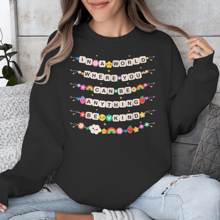 In A World Where You Can Be Anything Be Kind Girls Teachers Unisex Sweatshirt, funny design