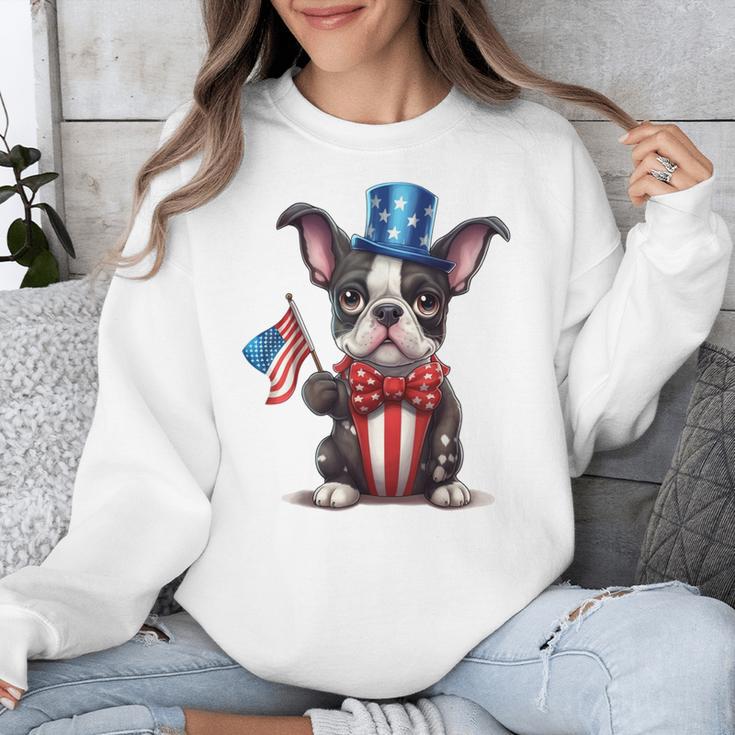 Boston Terrier Puppy Dog Holds His American Flag 4th Of July Unisex Sweatshirt, American Boston Terrier Gifts, Boston Terrier 4th Of July Gifts, funny design