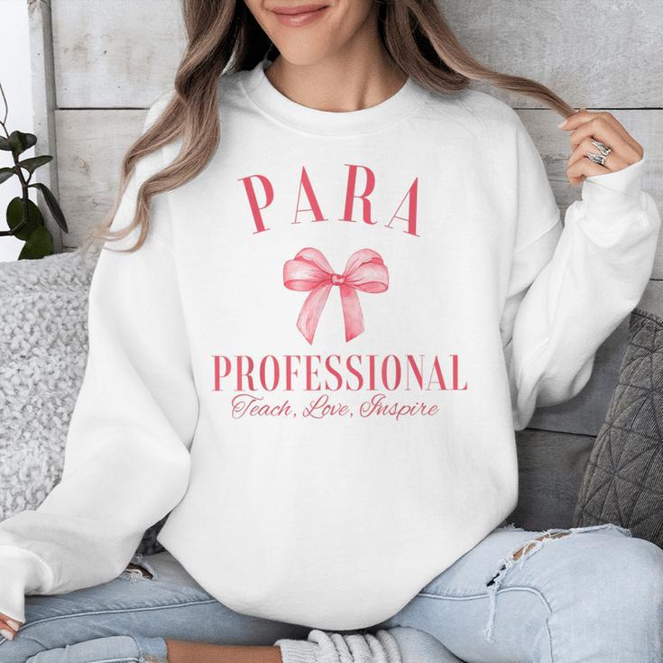 Coquette Bow Paraprofessional School Para Squad Teacher Aide Unisex Sweatshirt, funny design Coquette Bow Paraprofessional School Para Squad Teacher Aide Unisex Sweatshirt, funny design