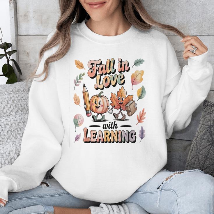 Fall In Love With Learning Teacher Autumn School Unisex Sweatshirt, funny design Fall In Love With Learning Teacher Autumn School Unisex Sweatshirt, funny design