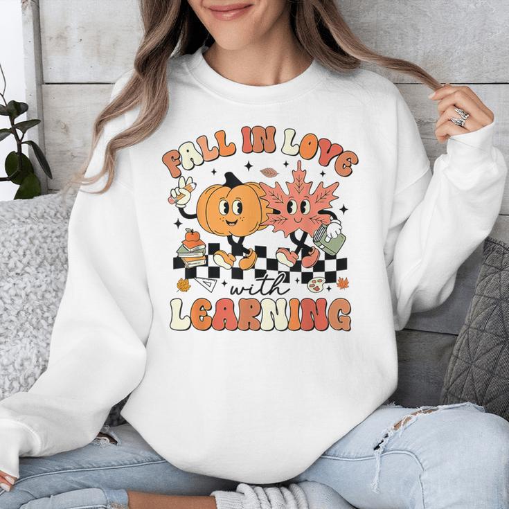 Fall In Love With Learning Teacher Retro Thanksgiving Unisex Sweatshirt, funny design Fall In Love With Learning Teacher Retro Thanksgiving Unisex Sweatshirt, funny design