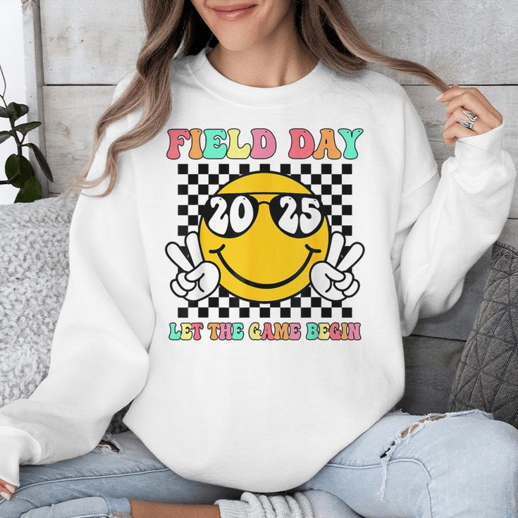 Field Day 2025 Let The Games Begin Yellow Team Teachers Kids Unisex Sweatshirt, funny design Field Day 2025 Let The Games Begin Yellow Team Teachers Kids Unisex Sweatshirt, funny design