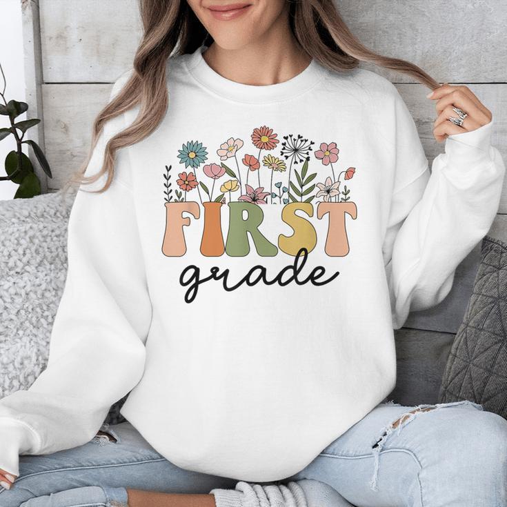 First Grade Teacher Wildflower Back To School Floral Outfits Unisex Sweatshirt, First Grade Teacher Gifts, funny design First Grade Teacher Wildflower Back To School Floral Outfits Unisex Sweatshirt, First Grade Teacher Gifts, funny design