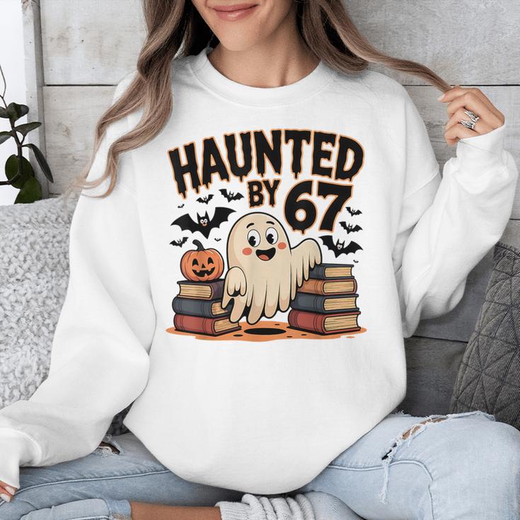 Haunted By 67 Teacher Ghost Pumpkin Halloween Costum Unisex Sweatshirt, funny design