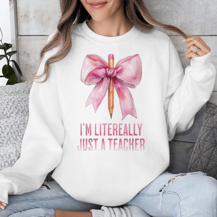 I'm Literally Just a Teacher Pencil Coquette Bow School Unisex Sweatshirt, funny design I'm Literally Just a Teacher Pencil Coquette Bow School Unisex Sweatshirt, funny design