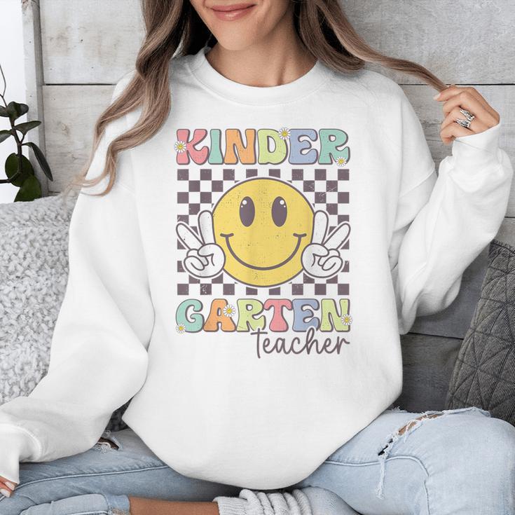Kindergarten Teacher Team Hippie Smile Face Back To School Unisex Sweatshirt, funny design Kindergarten Teacher Team Hippie Smile Face Back To School Unisex Sweatshirt, funny design