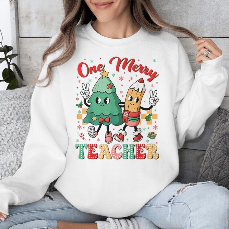 One Merry Teacher Groovy Christmas Tree Pjs Xmas Teacher Unisex Sweatshirt, Groovy Teacher Gifts, funny design One Merry Teacher Groovy Christmas Tree Pjs Xmas Teacher Unisex Sweatshirt, Groovy Teacher Gifts, funny design
