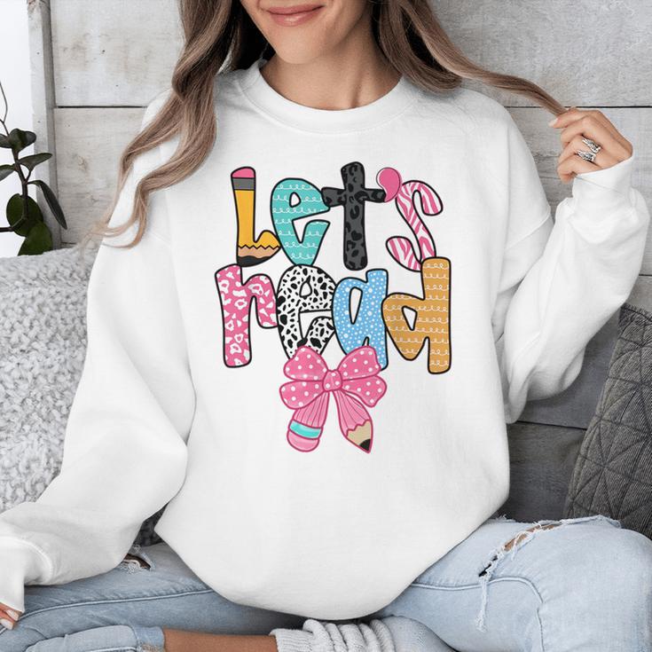 Lets Read Reading Teacher Back To School Literacy Pencil Bow Unisex Sweatshirt, funny design Lets Read Reading Teacher Back To School Literacy Pencil Bow Unisex Sweatshirt, funny design