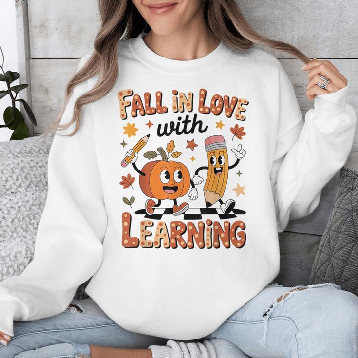 Retro Fall In Love With Learning Autumn Pumpkin Teacher Kids Unisex Sweatshirt, funny design Retro Fall In Love With Learning Autumn Pumpkin Teacher Kids Unisex Sweatshirt, funny design