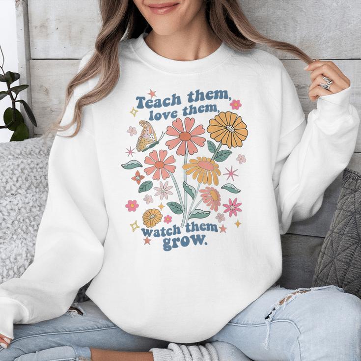 Teach Them Love Them Watch Them Grow Retro Teacher Floral Unisex Sweatshirt, funny design