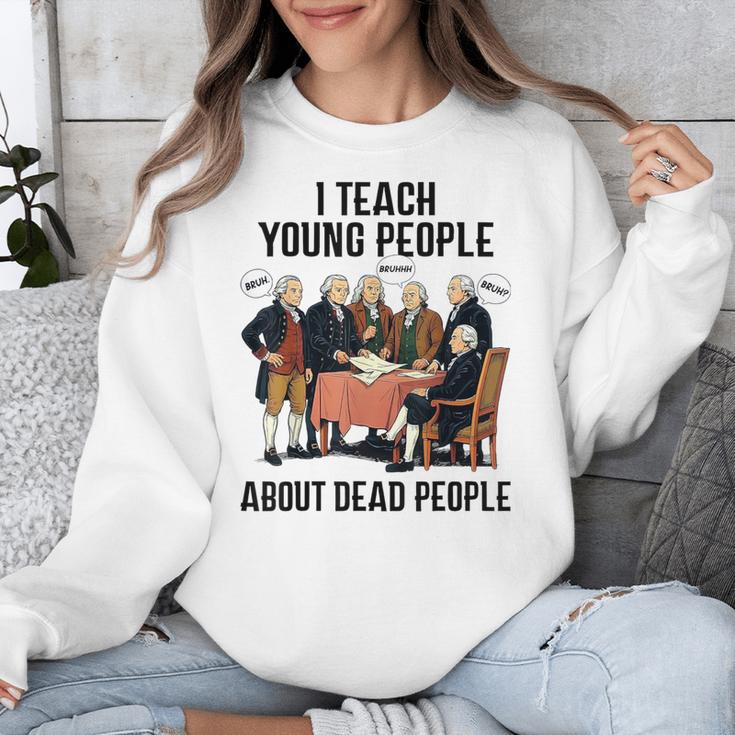 I Teach Young People About Dead-People History Teachers Unisex Sweatshirt, History Teacher Gifts, funny design I Teach Young People About Dead-People History Teachers Unisex Sweatshirt, History Teacher Gifts, funny design