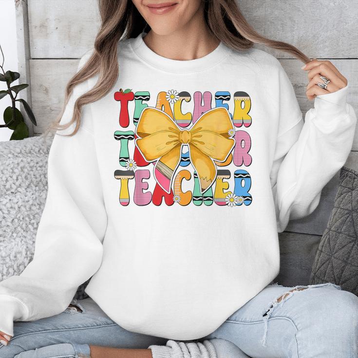 Teacher Pencil Coquette Bow Back To School Teacher Unisex Sweatshirt, funny design Teacher Pencil Coquette Bow Back To School Teacher Unisex Sweatshirt, funny design