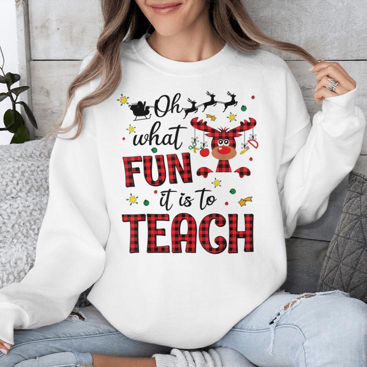 Teachers Oh What Fun It Is To Teach Cute Red Plaid Reindeer Unisex Sweatshirt, funny design Teachers Oh What Fun It Is To Teach Cute Red Plaid Reindeer Unisex Sweatshirt, funny design