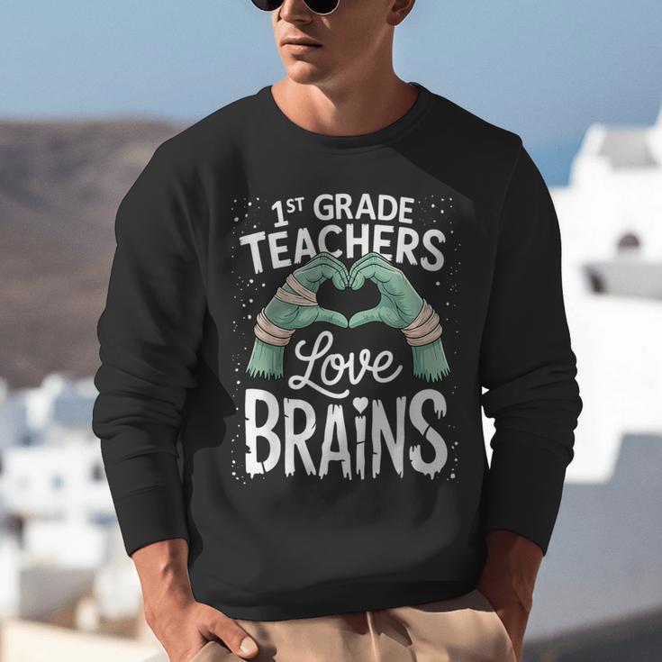 1st Grade Teachers Love Brains Shirt Halloween Teacher Unisex Sweatshirt, funny gift
