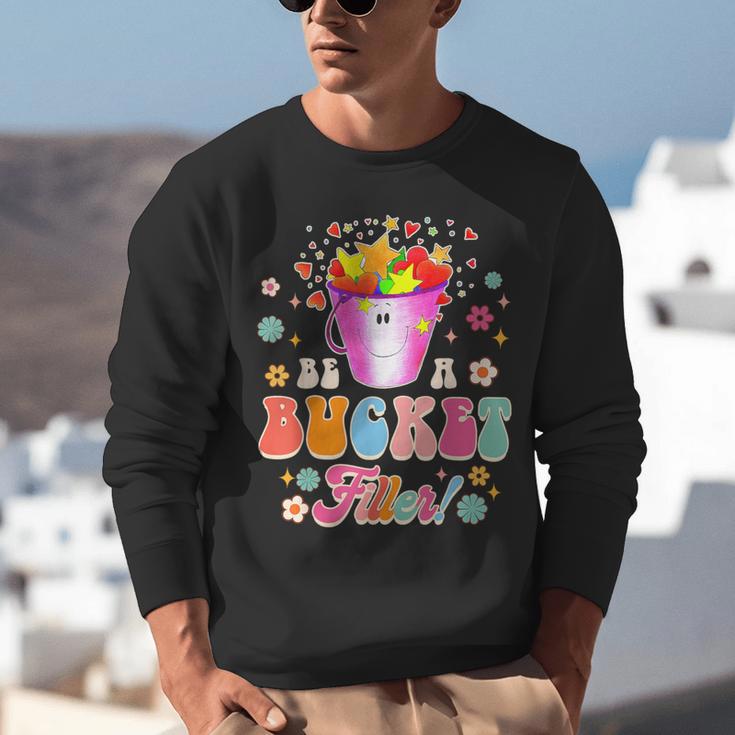 Be A Bucket Filler Teacher Teaching Groovy Back To School For Men Women Unisex Sweatshirt, Groovy Teacher Sweatshirts, funny gift Be A Bucket Filler Teacher Teaching Groovy Back To School For Men Women Unisex Sweatshirt, Groovy Teacher Sweatshirts, funny gift
