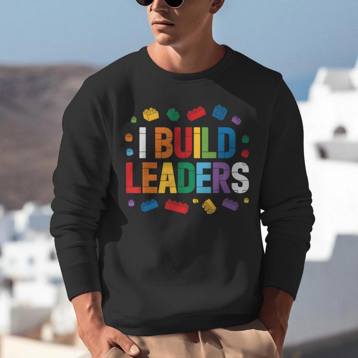 I Build Leaders Bricks Building Blocks Teacher Brick Builder Unisex Sweatshirt, funny gift
