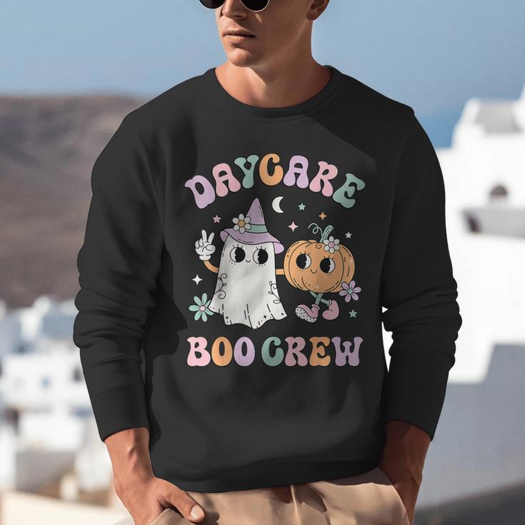 Daycare Boo Crew Groovy Halloween Floral Ghost Kid Teacher Unisex Sweatshirt, Groovy Teacher Sweatshirts, funny gift