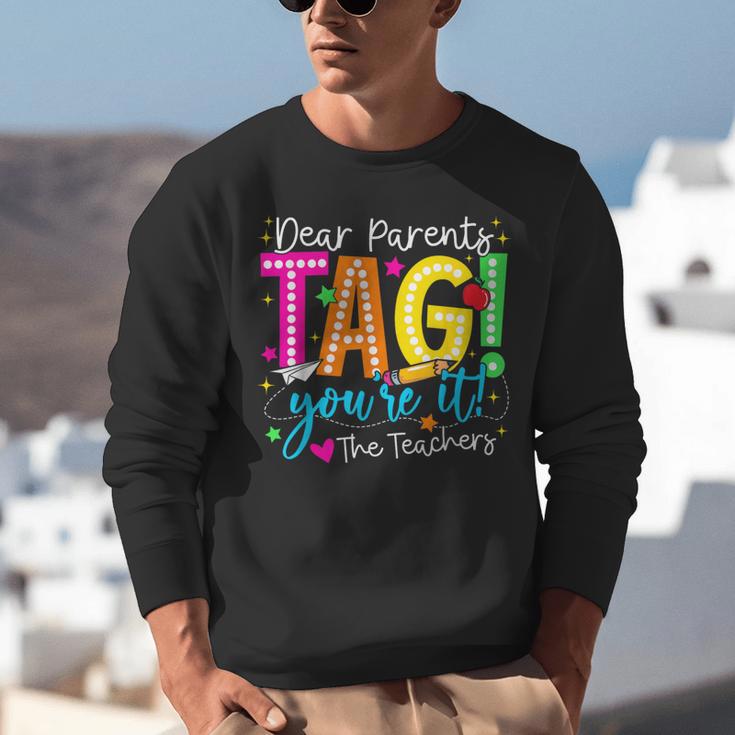 Dear Parents Tag You'Re It Love Teachers Last Day Of School Unisex Sweatshirt, funny gift Dear Parents Tag You'Re It Love Teachers Last Day Of School Unisex Sweatshirt, funny gift