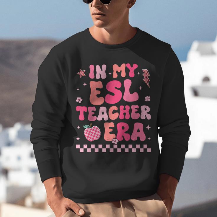 In My Esl Teacher Era Back To School ESL Teacher Groovy Unisex Sweatshirt, Esl Teacher Sweatshirts, Groovy Teacher Sweatshirts, funny gift In My Esl Teacher Era Back To School ESL Teacher Groovy Unisex Sweatshirt, Esl Teacher Sweatshirts, Groovy Teacher Sweatshirts, funny gift