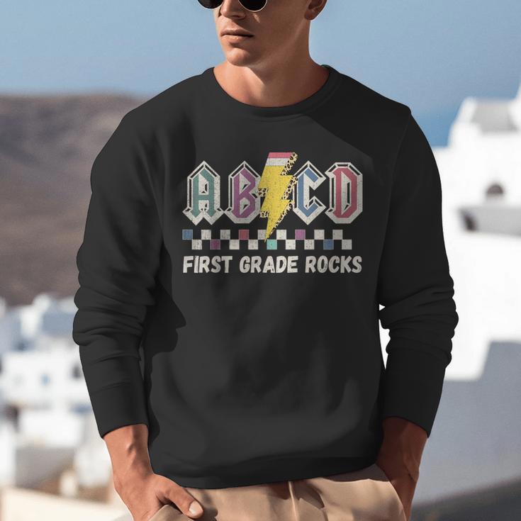 First Grade Rocks Teachers Back To School ABCD Rock Students Unisex Sweatshirt, First Grade Teacher Sweatshirts, funny gift First Grade Rocks Teachers Back To School ABCD Rock Students Unisex Sweatshirt, First Grade Teacher Sweatshirts, funny gift