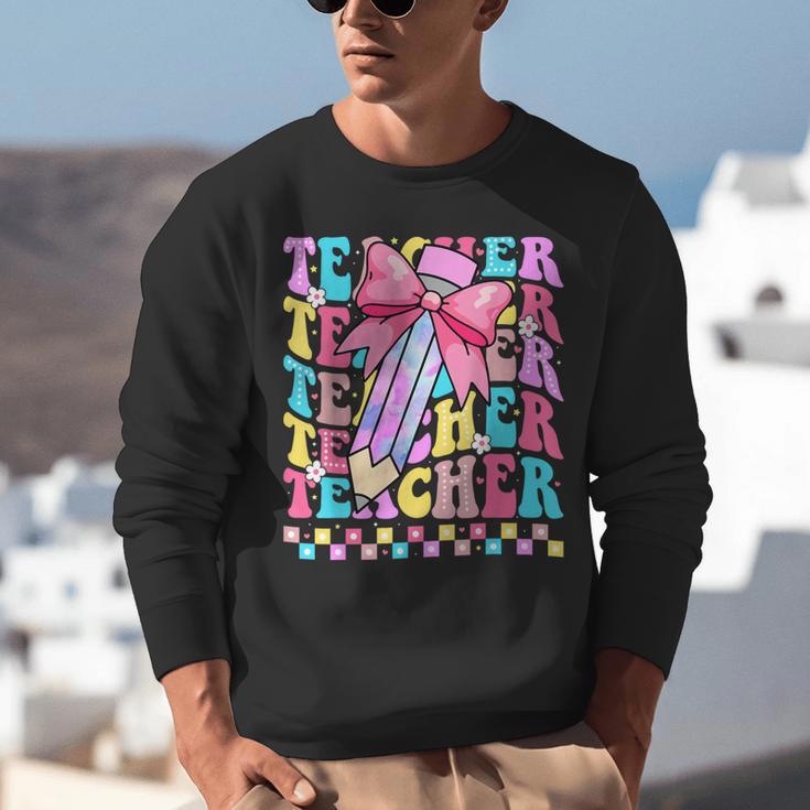 Groovy Teacher Cute Coquette Bow Flower Retro Back To School Unisex Sweatshirt, Groovy Teacher Sweatshirts, funny gift Groovy Teacher Cute Coquette Bow Flower Retro Back To School Unisex Sweatshirt, Groovy Teacher Sweatshirts, funny gift