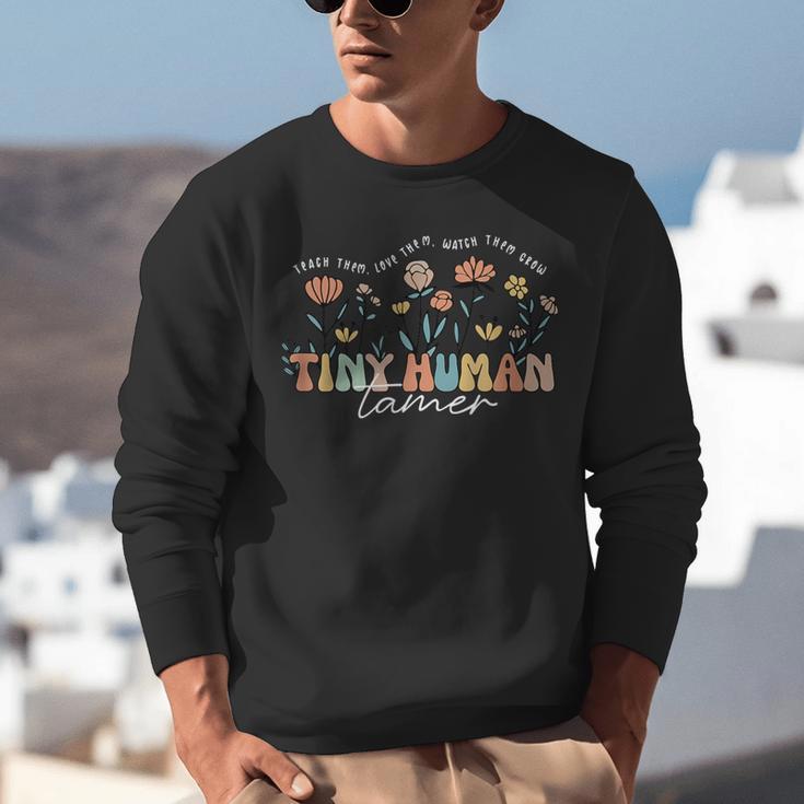 Groovy Tiny Human Tamer Floral Kindergarten Teacher Unisex Sweatshirt, Groovy Teacher Sweatshirts, funny gift