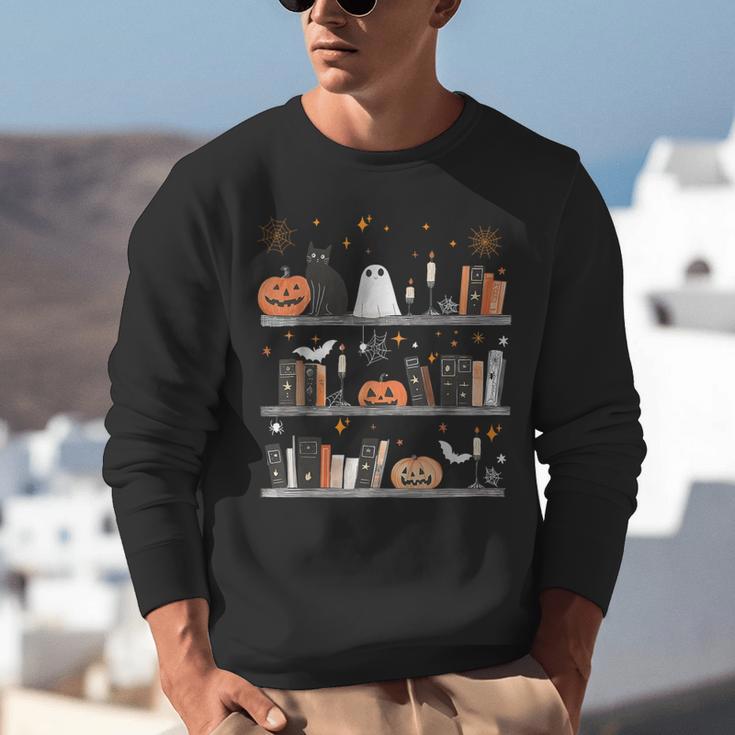 Halloween Library Ghost Books Teacher Spooky Trick Or Teach Unisex Sweatshirt, funny gift Halloween Library Ghost Books Teacher Spooky Trick Or Teach Unisex Sweatshirt, funny gift